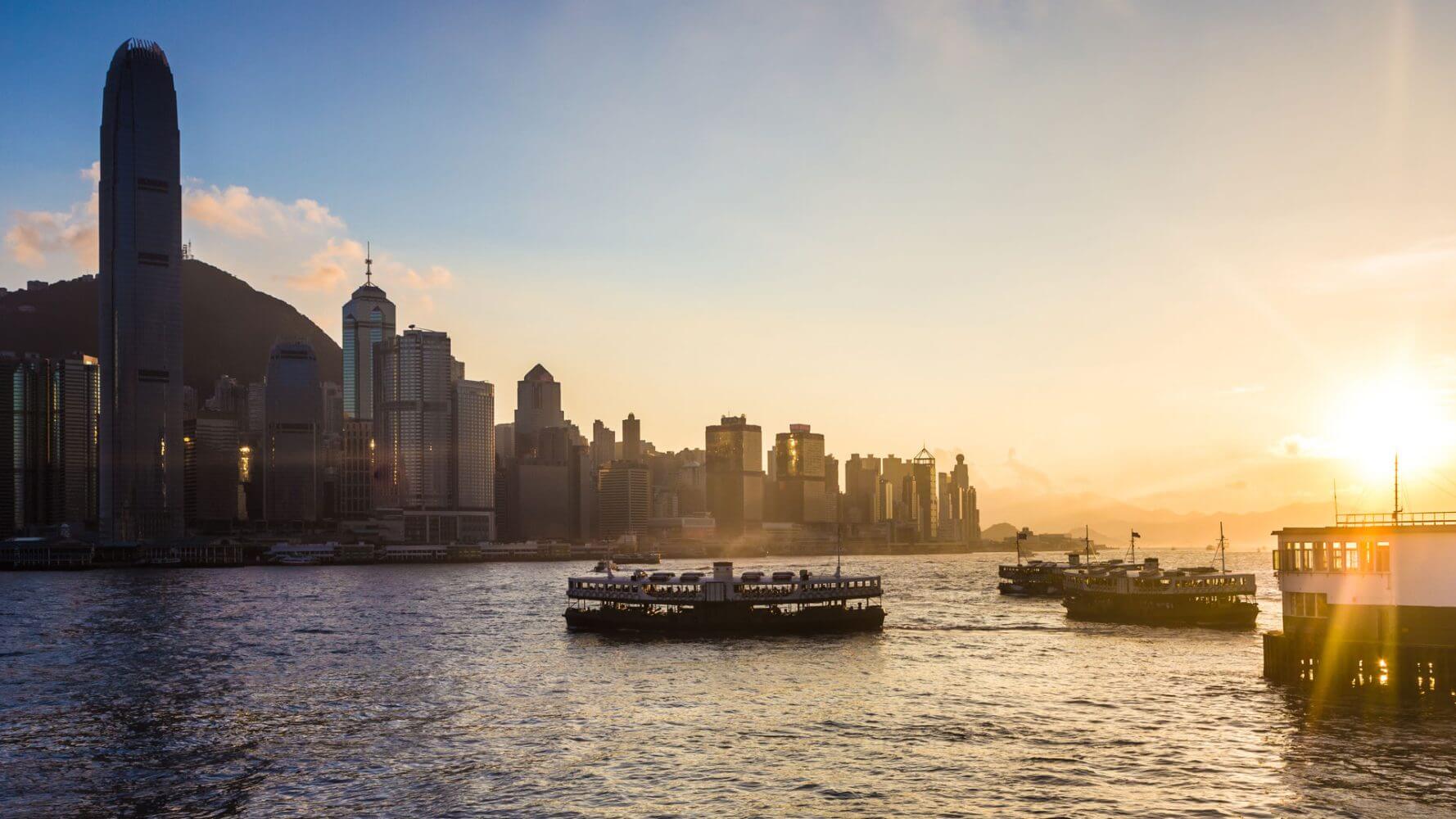 Sunset over Victoria harbor in Hong Kong