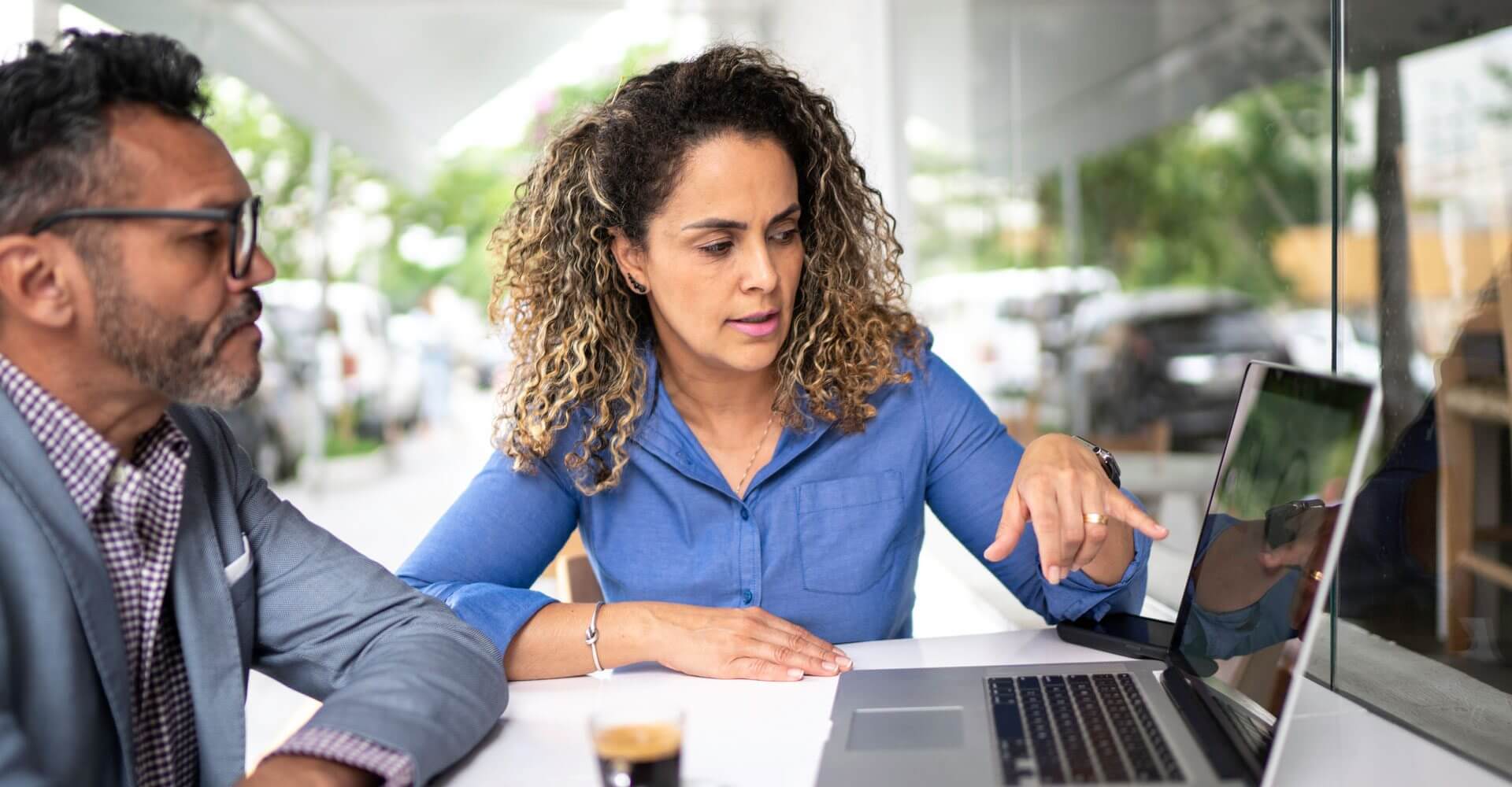 A couple searches for options on their laptop.