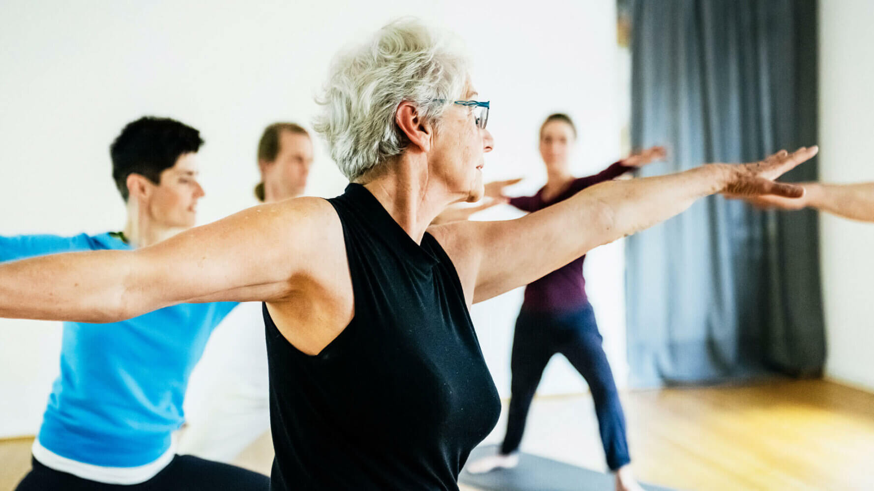 A woman leads a yoga class, helping clients is crucial