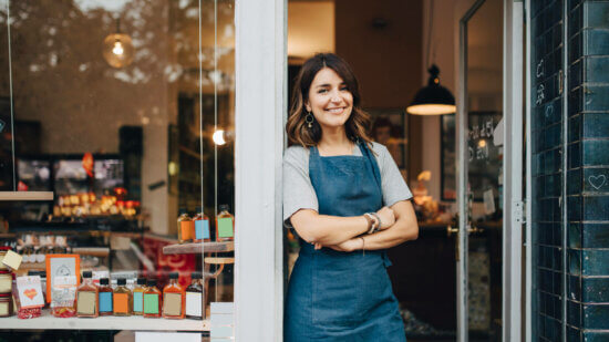 Store owner smiles as she stays offline in the brick and mortar space