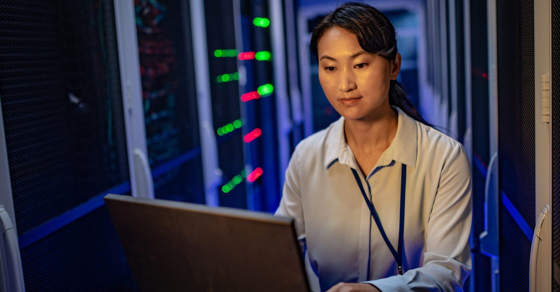 ESG Initiatives in Chinese Data Centers, woman shown working in a data center