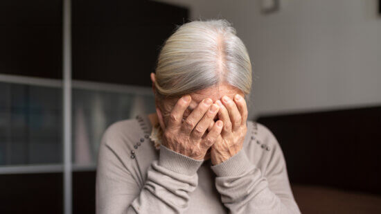 Woman worried about her retirement savings.