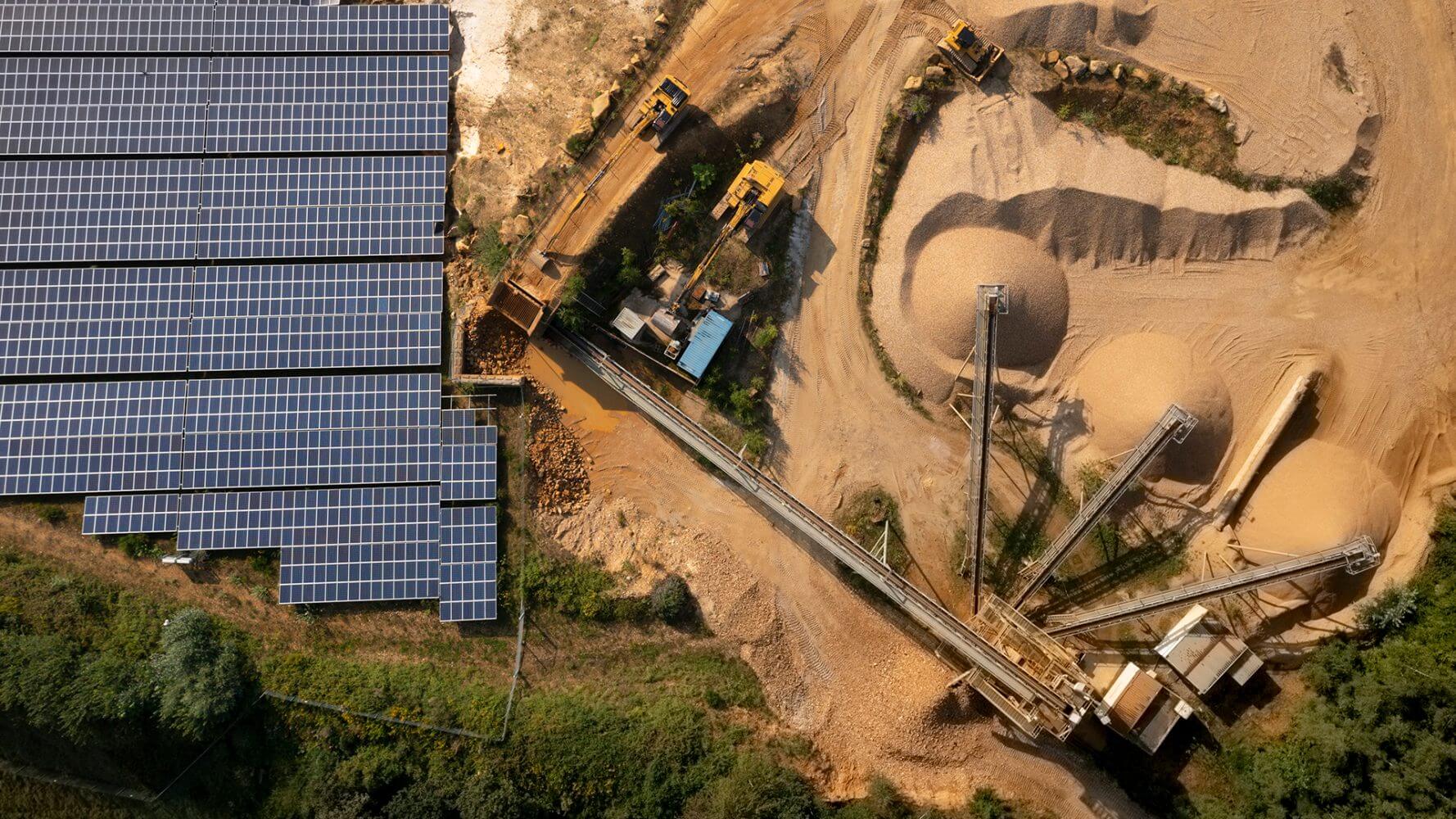 Germany, Herzogenrath, Overhead view of solar panels at sand mine