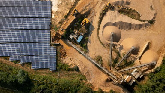 Germany, Herzogenrath, Overhead view of solar panels at sand mine