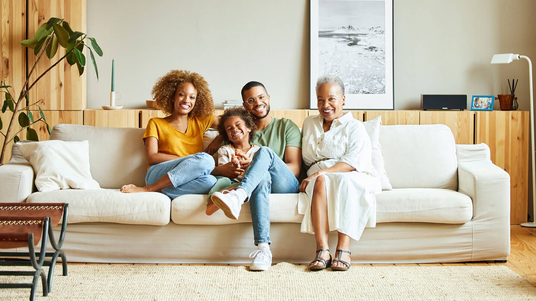 Multi-generational family on the couch together.