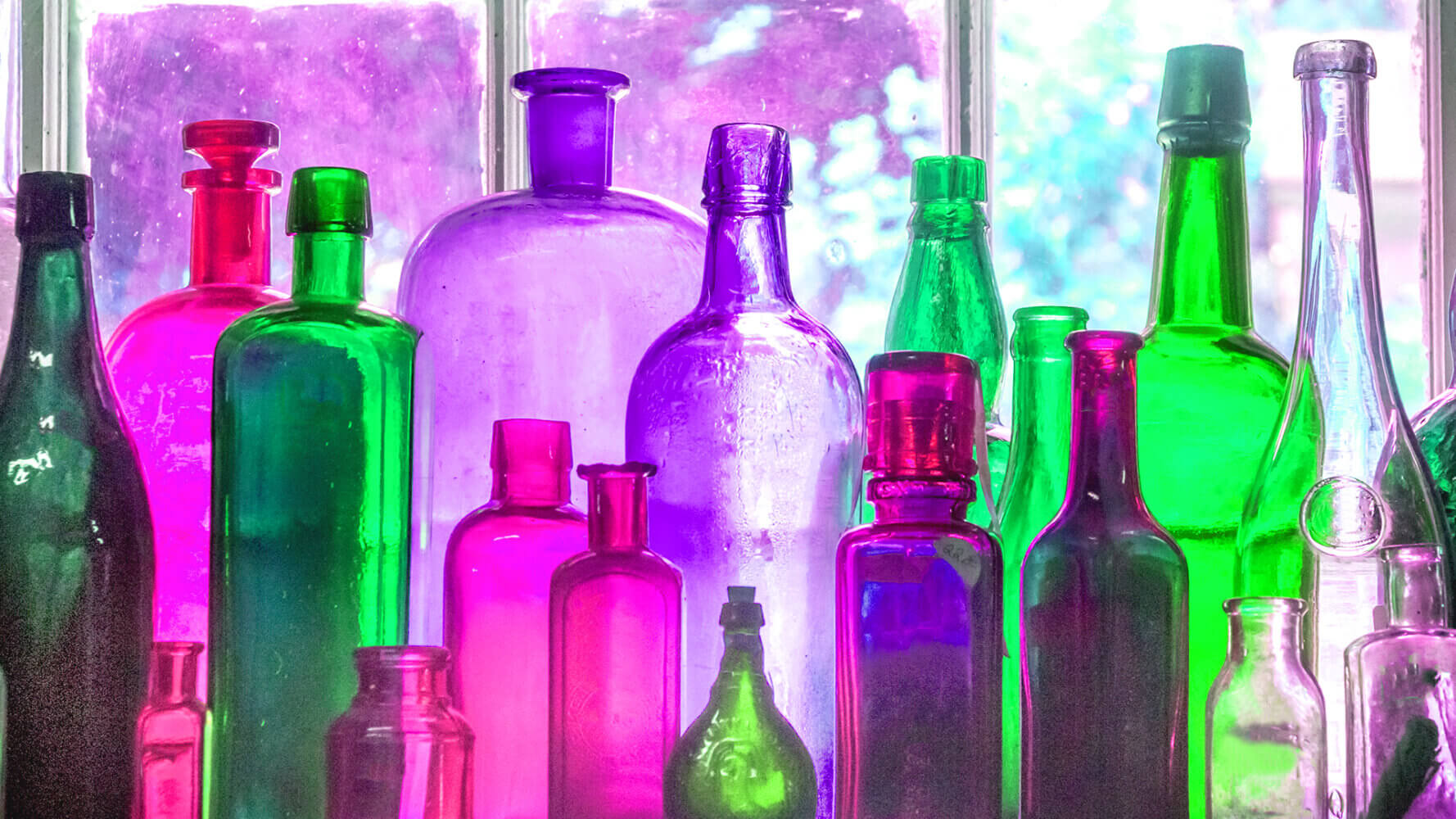 Various bottles representing alchemy of Low Interest Rates: Corporate and Government Bonds