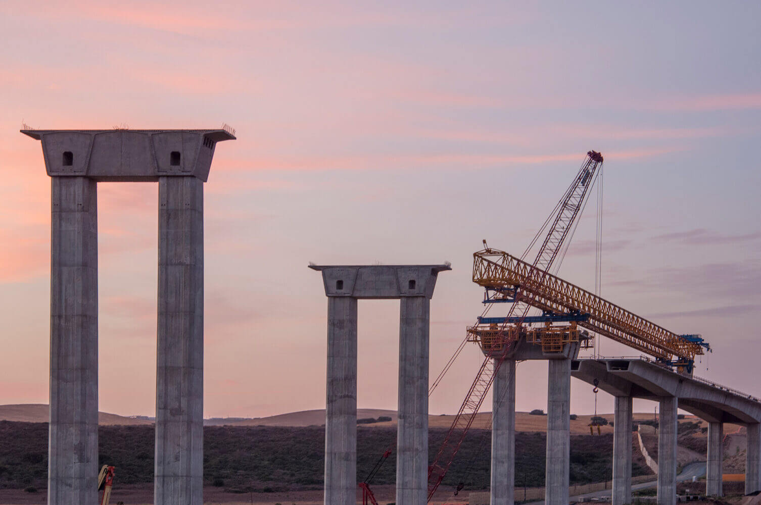 The construction of the Otay Mesa Bridge in San Diego county in CA,-USA. In this method, the bridge is constructed with the help of precast concrete elements. The prefabrication is performed in different methods.