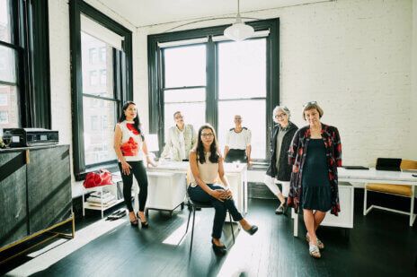 Group portrait of businesswomen in creative office