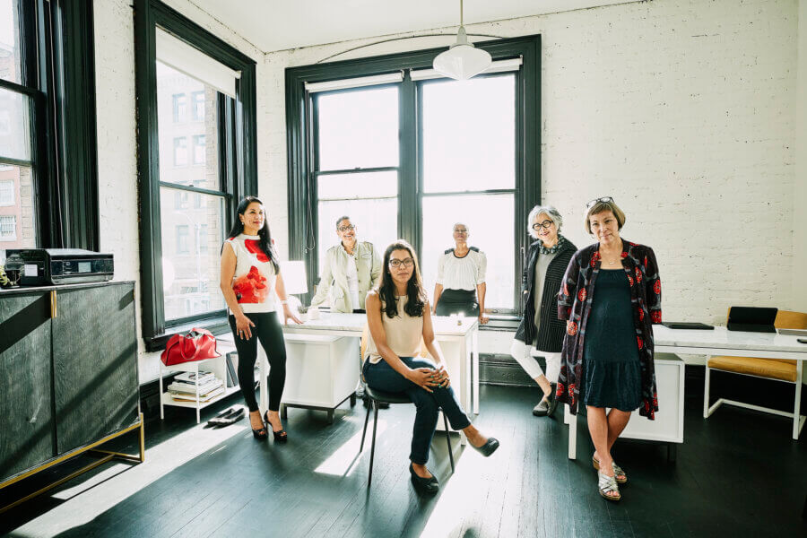 Group portrait of businesswomen in creative office