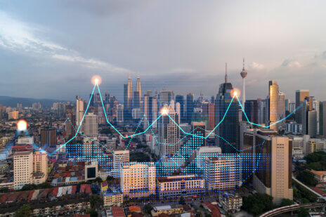 Blue trend lines overlaid on a city skyline